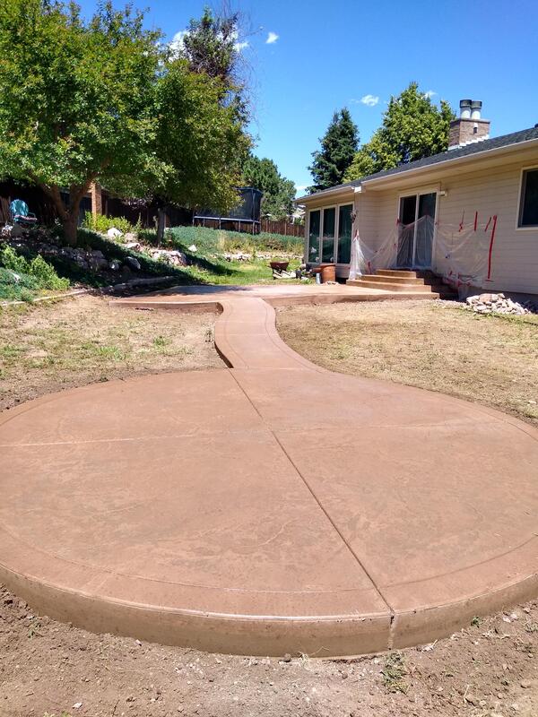 new stamped concrete patio and walkway