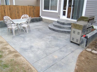 new concrete patio with stairs