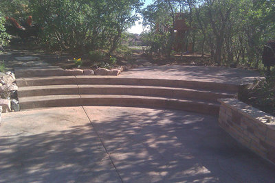 custom 2 level stamped concrete patio with stairs