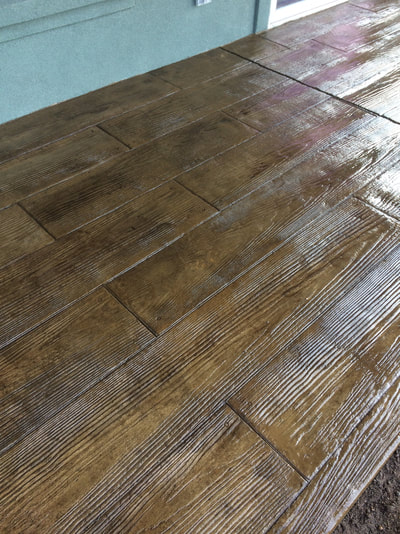 Stamped concrete with a wood floor look