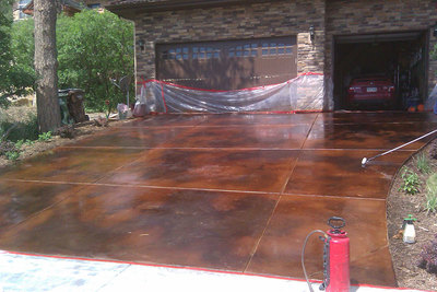 stained and polished concrete driveway